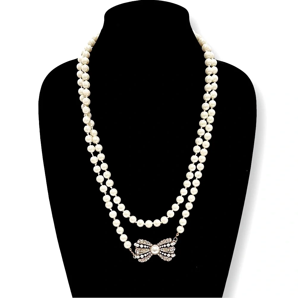 Miss Mandy's Double-Strand Ivory Pearl Necklace with Jeweled Bow Accent